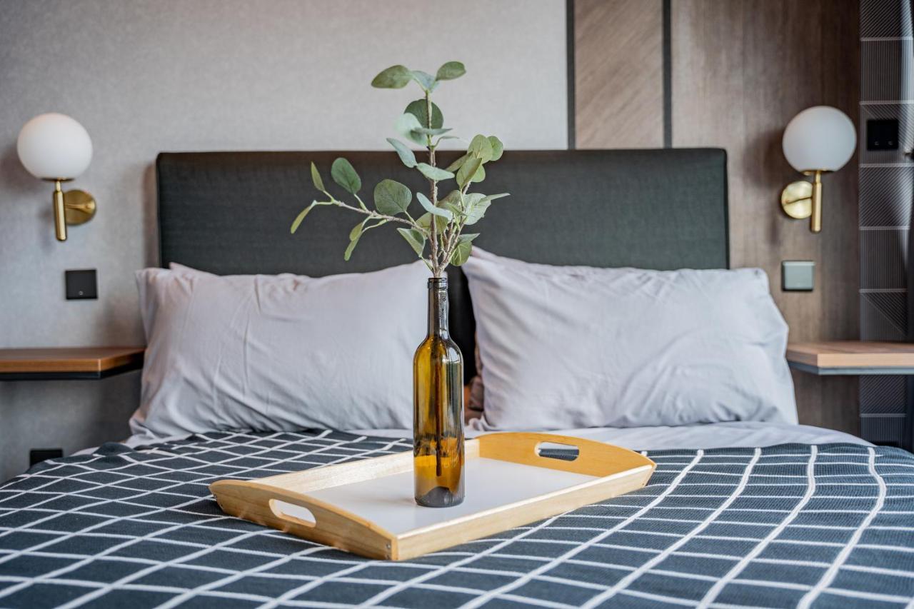 Opus Residences By Airhost Apartemen *